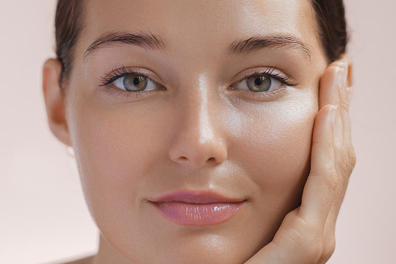 Face of woman with smooth skin after facial