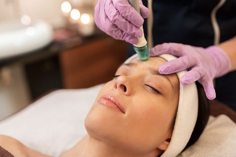 woman getting hydro facial treatment